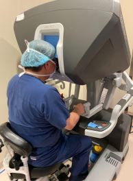 Dr. Miranda using the Da Vinci surgical system