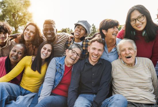 A group photo of a smiling family